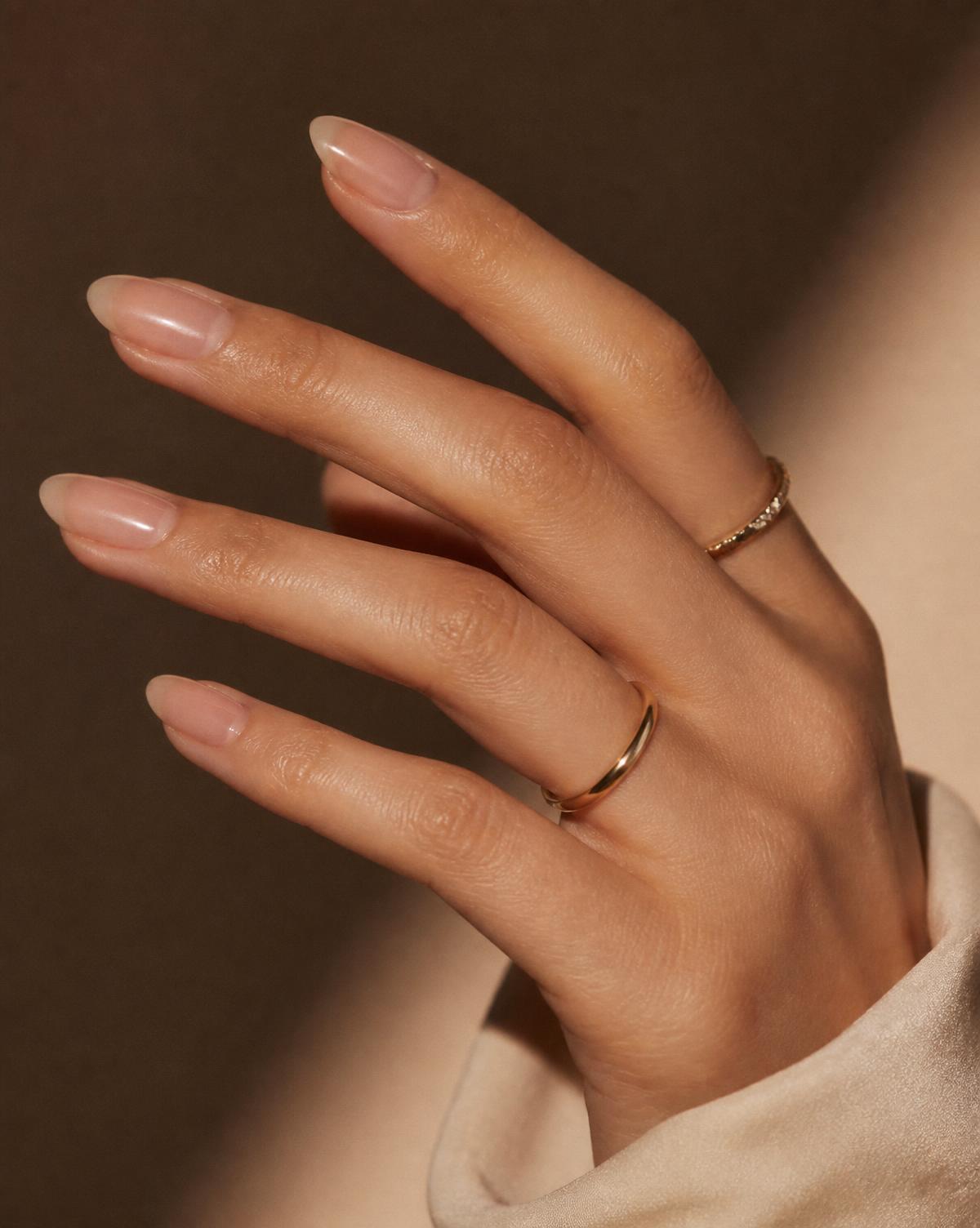 Premium high quality nails to you: close-up of a glossy natural manicure at home in Sydney